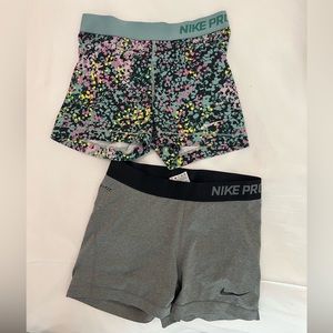 2 pairs of Nike spanx - Size women’s Medium